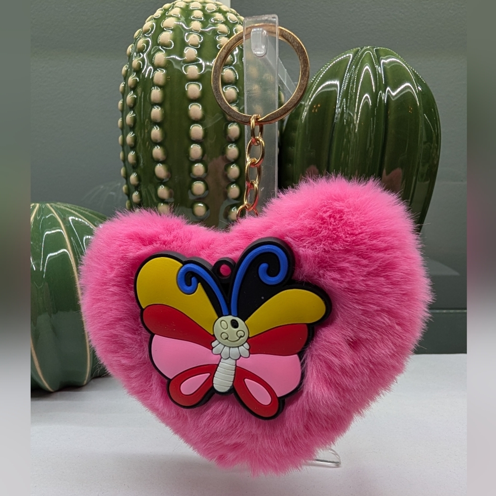 Pink Heart-Shaped Furry Keychain with Butterfly Design